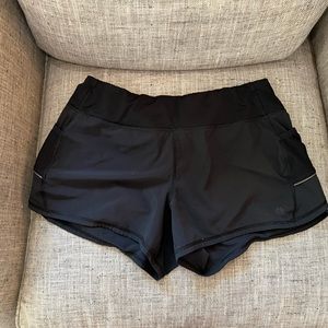 Athlete running shorts, size medium